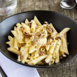 Quattro Formaggi - penne with cream, mascarapone, taleggio & parmesan cheese, finished with walnuts